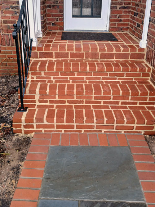 Detail of new brick border and flagstone